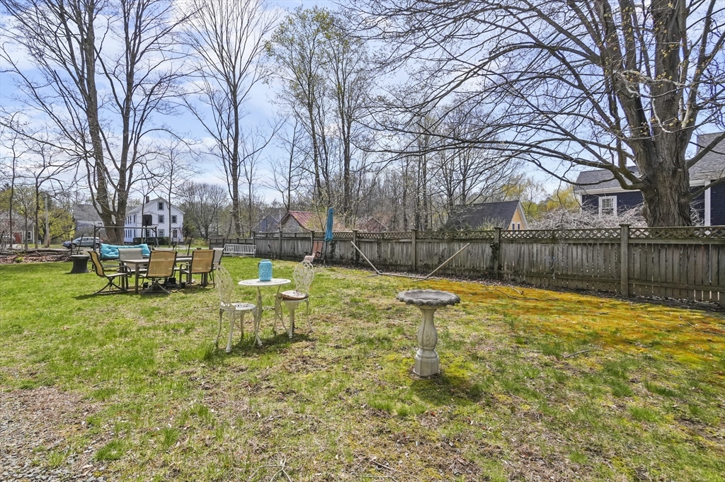 6 Prospect Street Merrimac, MA 01860 - Photo 32 of 40 a view of backyard with swimming pool and seating area