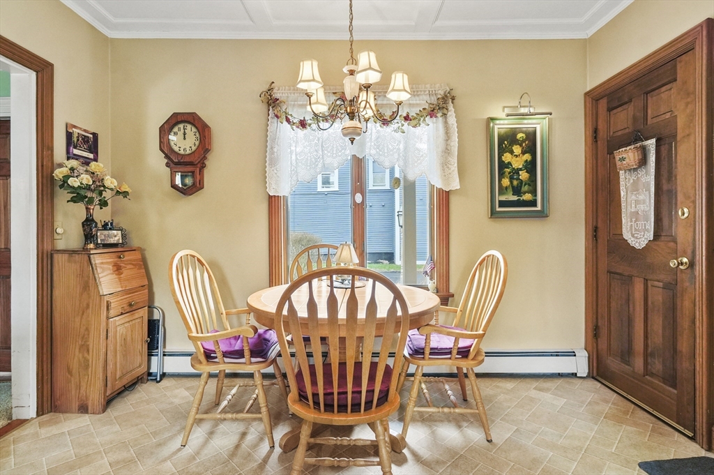 6 Prospect Street Merrimac, MA 01860 - Photo 5 of 40 a view of a dining room with furniture and chandelier