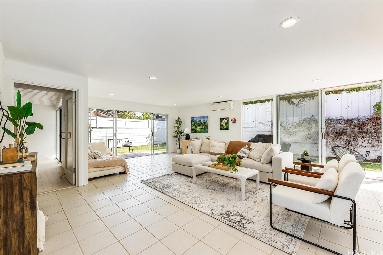 532 Portlock Road Honolulu, HI 96825 - Photo 12 of 25 a living room with furniture or couch and a large window