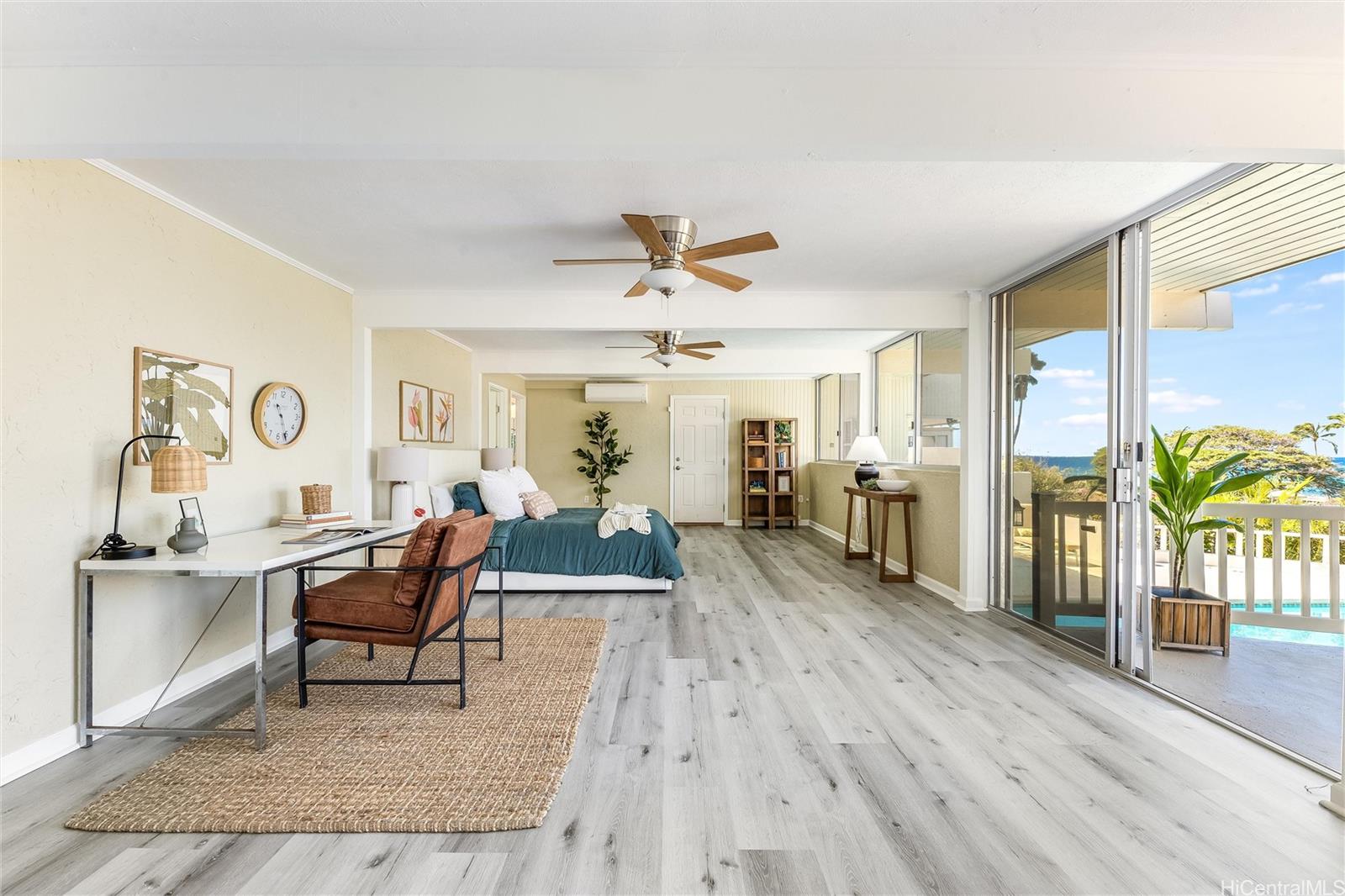 532 Portlock Road Honolulu, HI 96825 - Photo 13 of 25 a living room with furniture and wooden floor