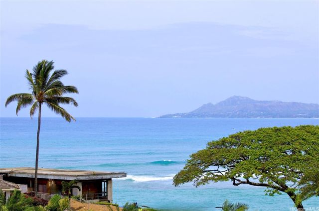 a view of a lake with a mountain in the background