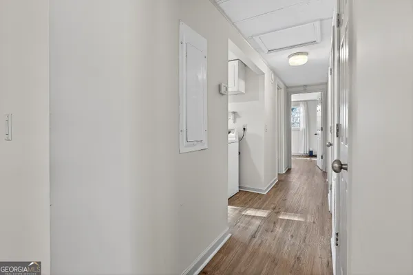 a view of a livingroom from a hallway