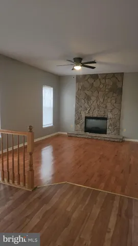 a kitchen with a stove a sink and a microwave