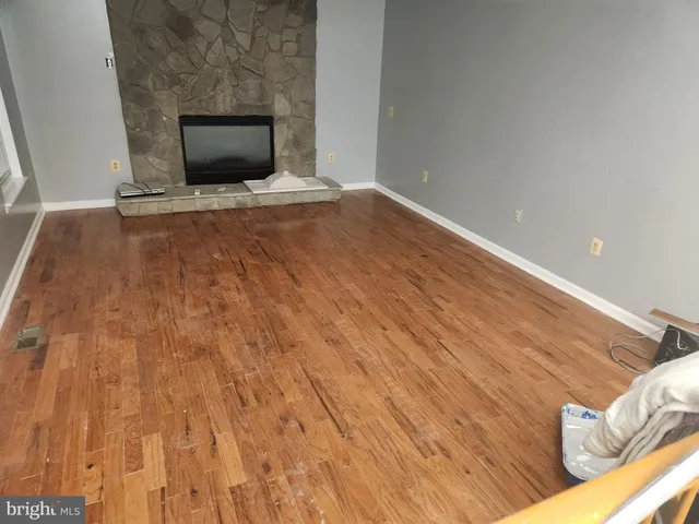 a view of a room with staircase and window