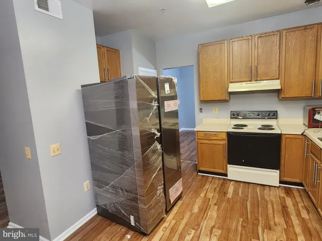 a bathroom with a bathtub and toilet