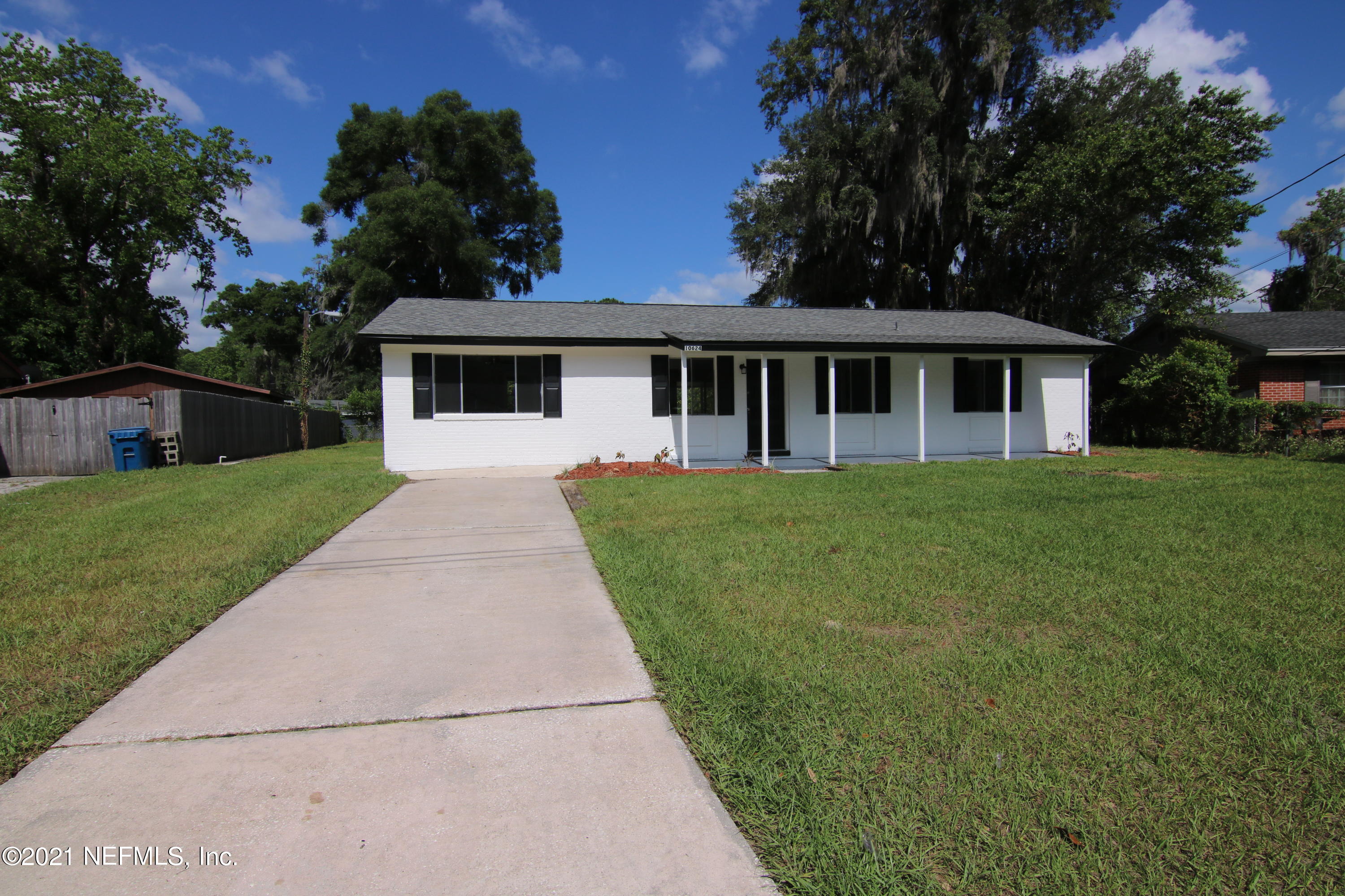 10624 Dodd Road Jacksonville, FL 32218 - Photo 21 of 21 a front view of house with yard and green space