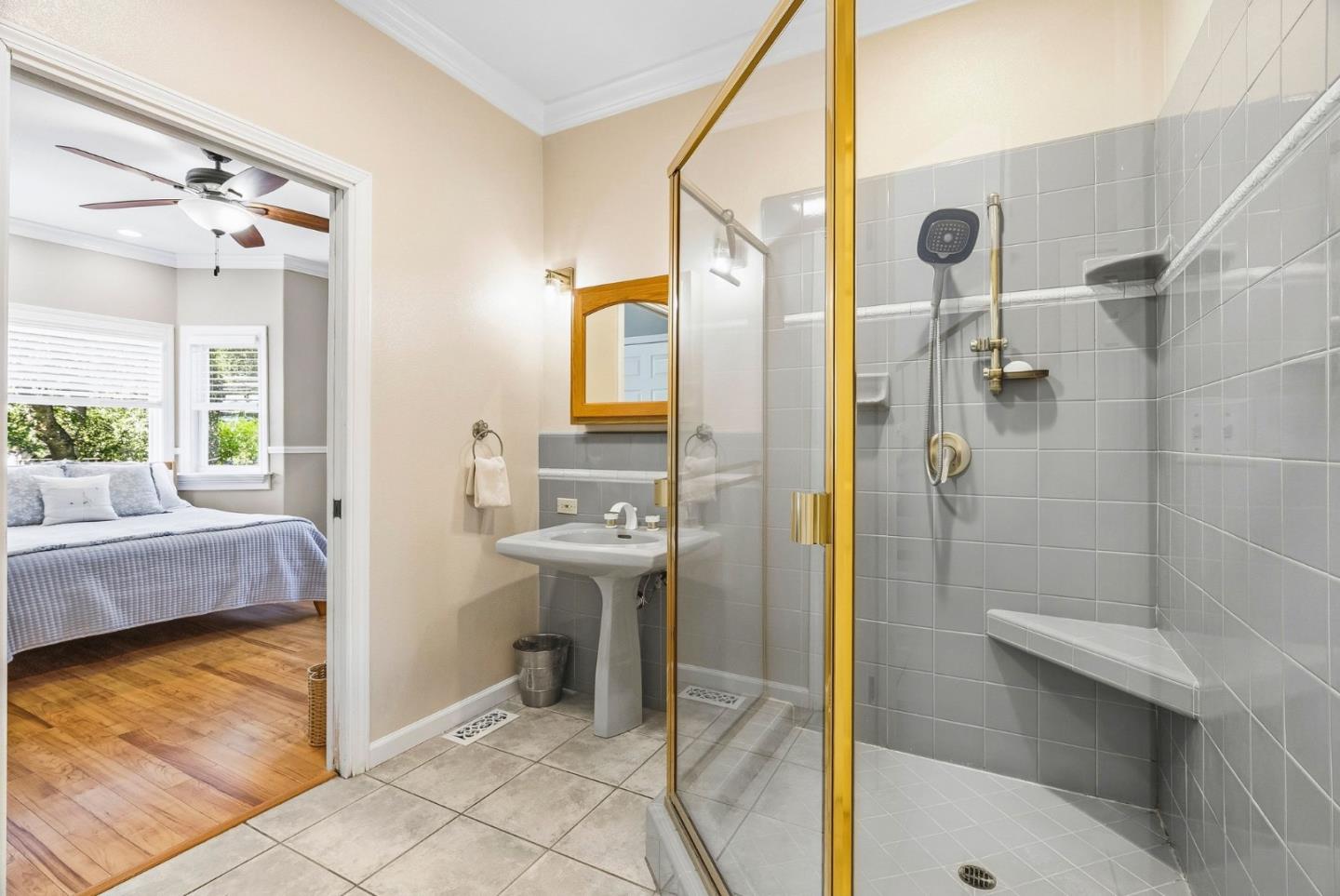 2500 Nelson Road Scotts Valley, CA 95066 - Photo 29 of 77 a bathroom with a tub a sink and glass door