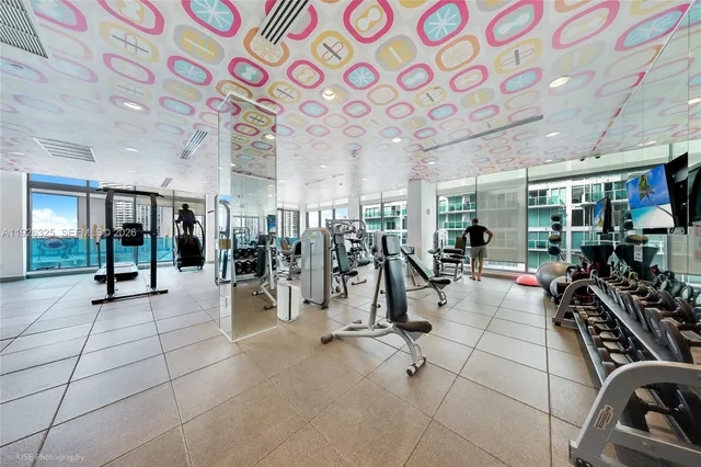 a room with lots of chairs and tables