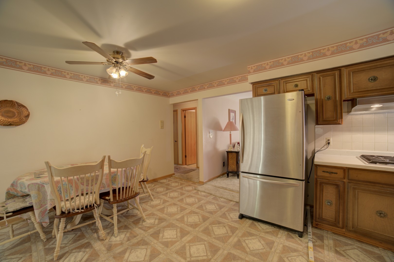 405 Deitrick Street Donovan, IL 60931 - Photo 12 of 29 a kitchen with stainless steel appliances a refrigerator and microwave