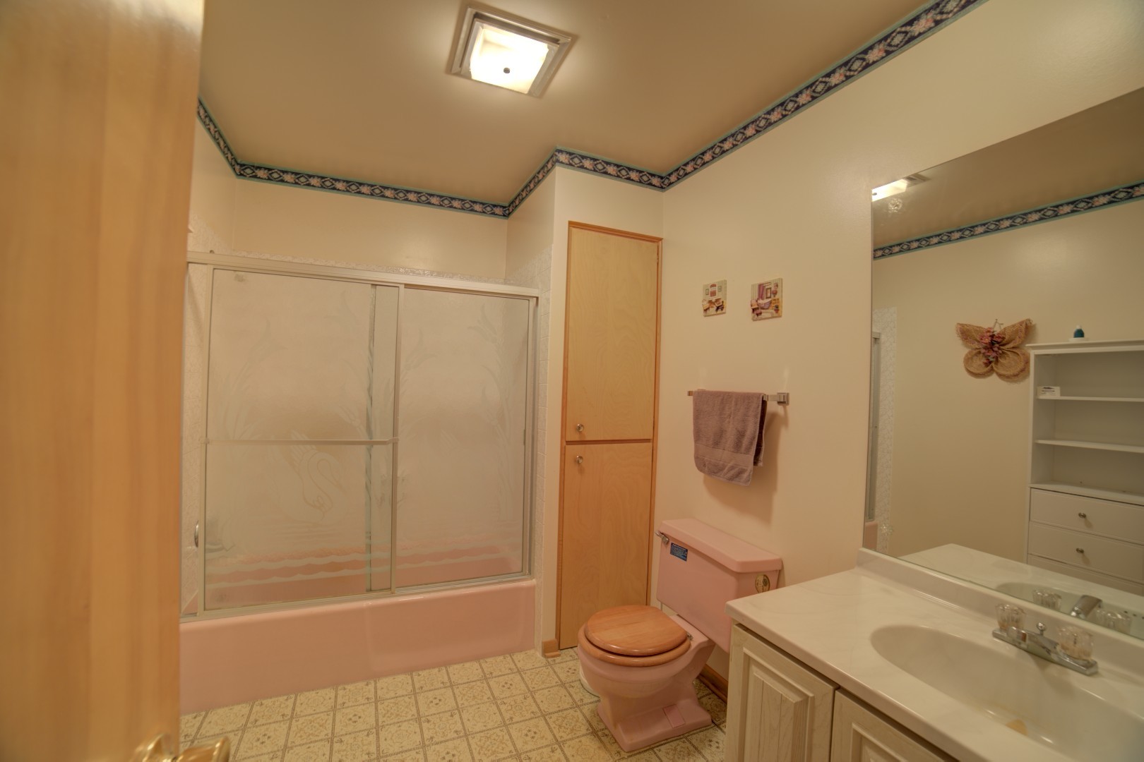 405 Deitrick Street Donovan, IL 60931 - Photo 17 of 29 a bathroom with a granite countertop sink toilet and shower