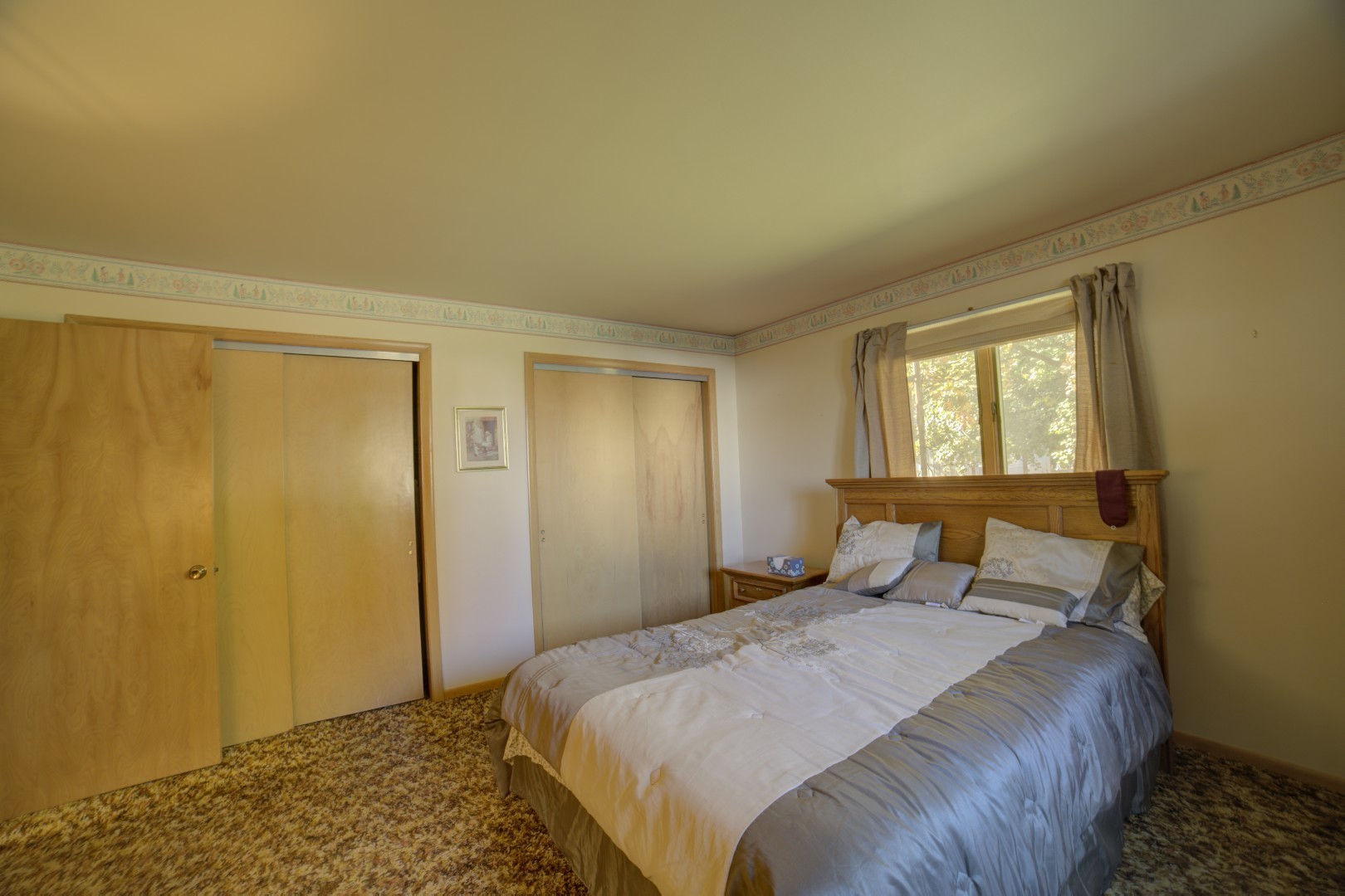 405 Deitrick Street Donovan, IL 60931 - Photo 21 of 29 a bedroom with a bed and a window