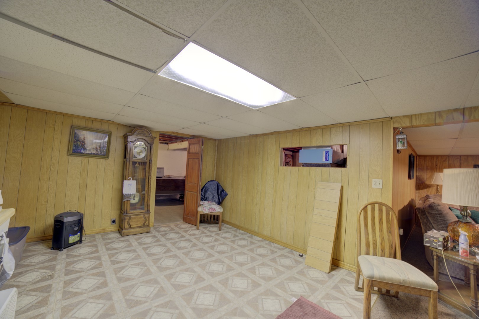 405 Deitrick Street Donovan, IL 60931 - Photo 27 of 29 a view of a livingroom with furniture and a hallway