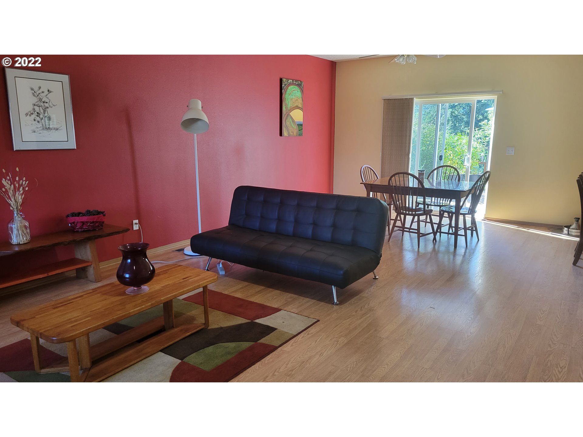 816 Southeast Darrow Road Estacada, OR 97023 - Photo 4 of 29 a living room with furniture and a wooden floor