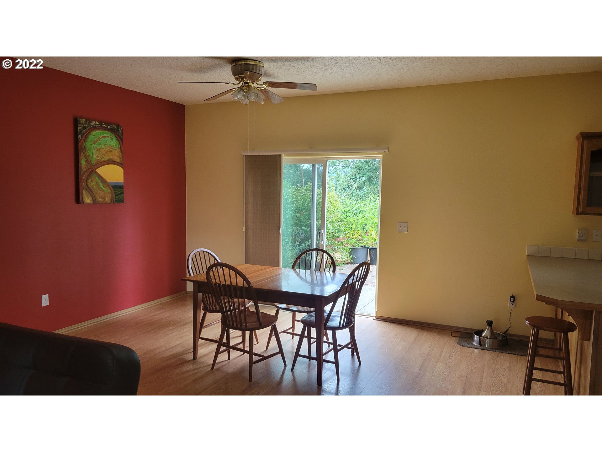 816 Southeast Darrow Road Estacada, OR 97023 - Photo 6 of 29 a kitchen with a table and chairs in it