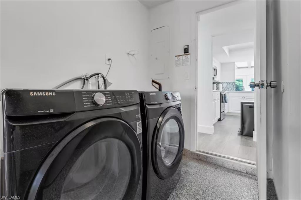 514 14th Street North Naples, FL 34102 - Photo 17 of 22 a utility room with dryer and washer