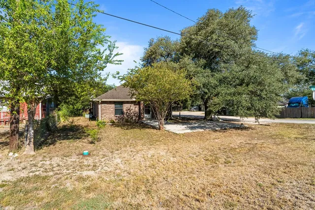 a view of a house with snow on the ground