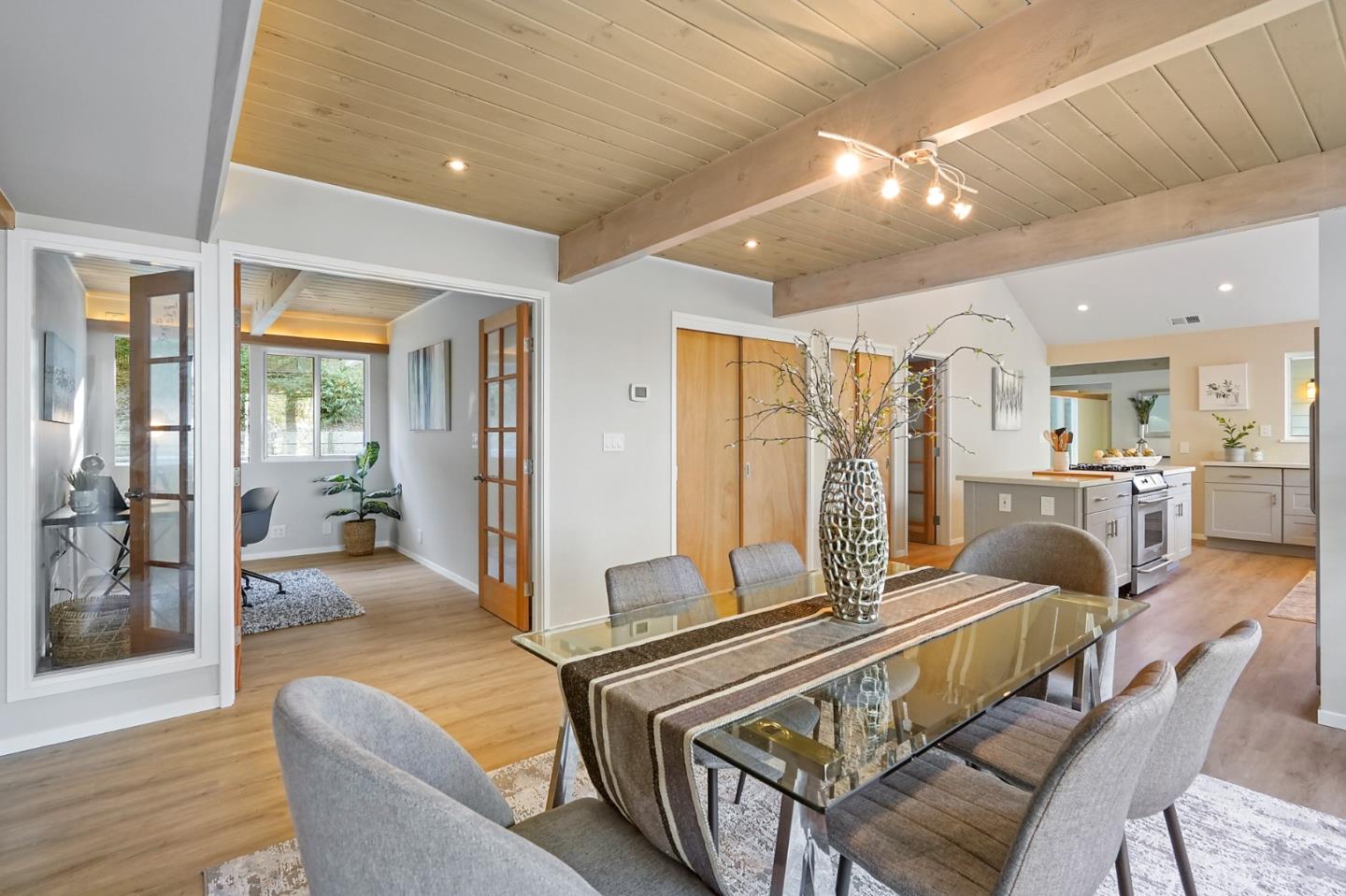 1183 Millbrae Avenue Millbrae, CA 94030 - Photo 11 of 98 a living room with furniture and a table
