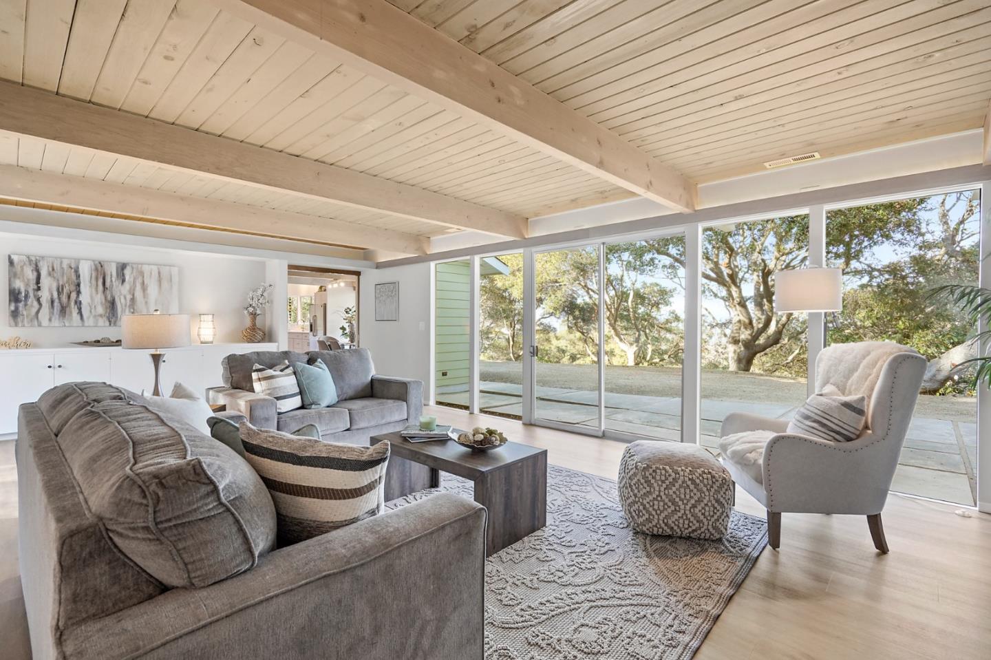 1183 Millbrae Avenue Millbrae, CA 94030 - Photo 14 of 98 a living room with furniture and a large window with balcony view