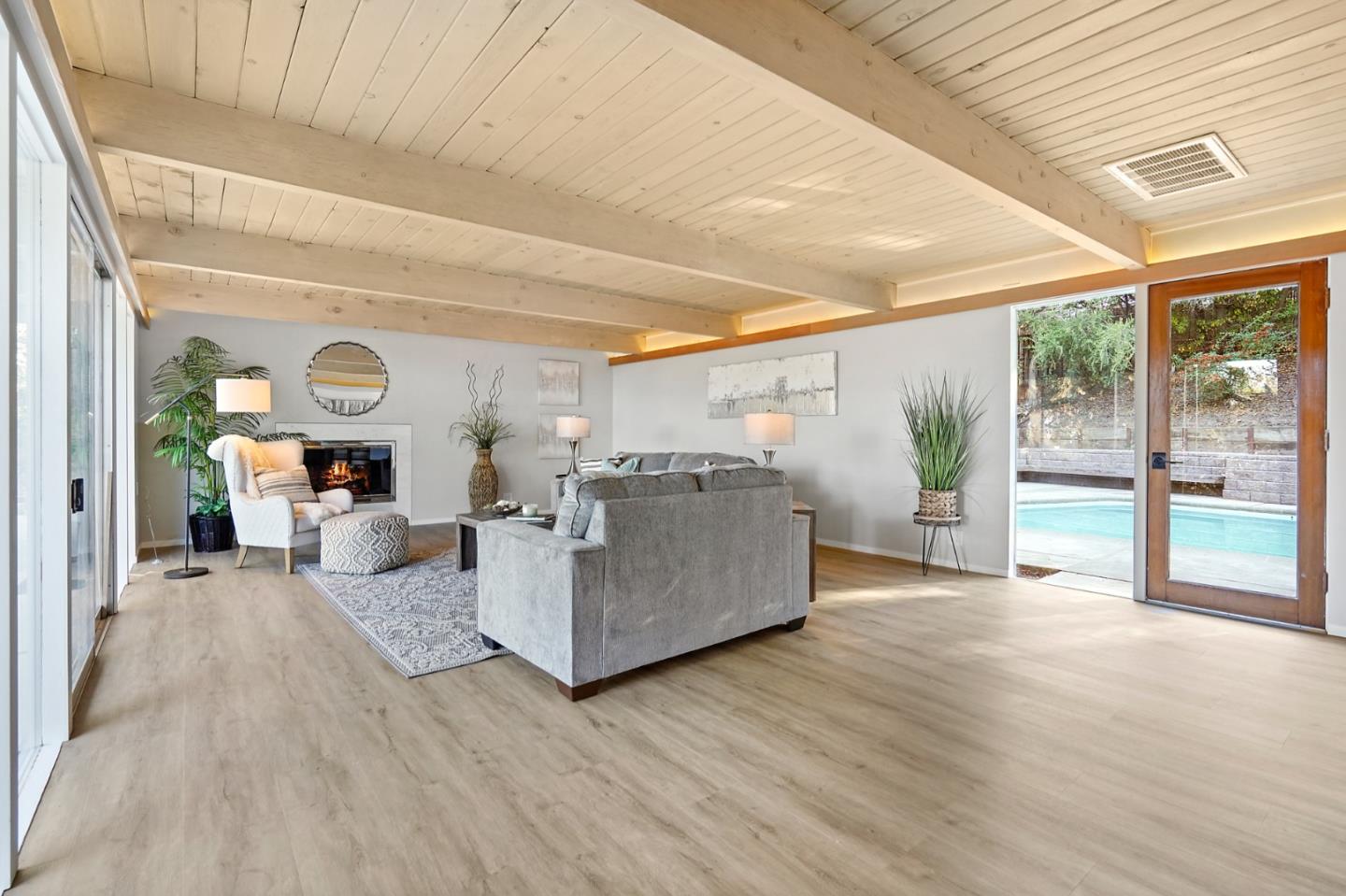 1183 Millbrae Avenue Millbrae, CA 94030 - Photo 16 of 98 a living room with furniture and a large window