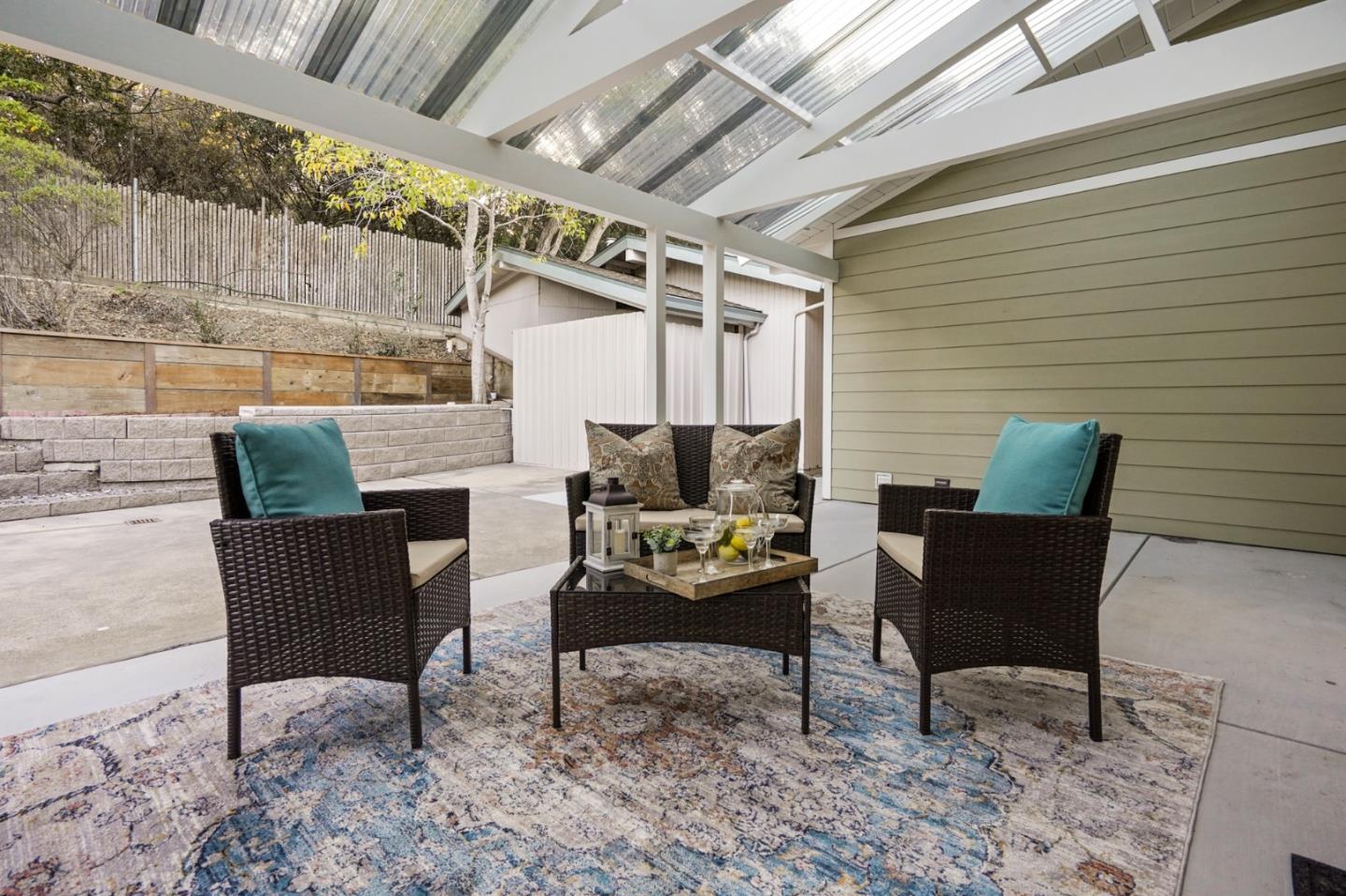 1183 Millbrae Avenue Millbrae, CA 94030 - Photo 33 of 98 a outdoor living space with furniture and a fireplace