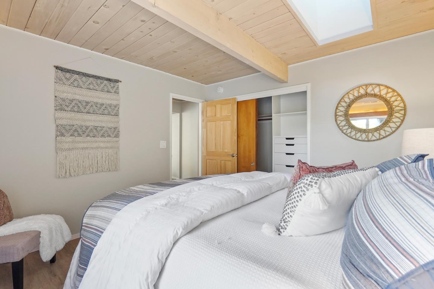 1183 Millbrae Avenue Millbrae, CA 94030 - Photo 42 of 98 a bedroom with a bed and a window