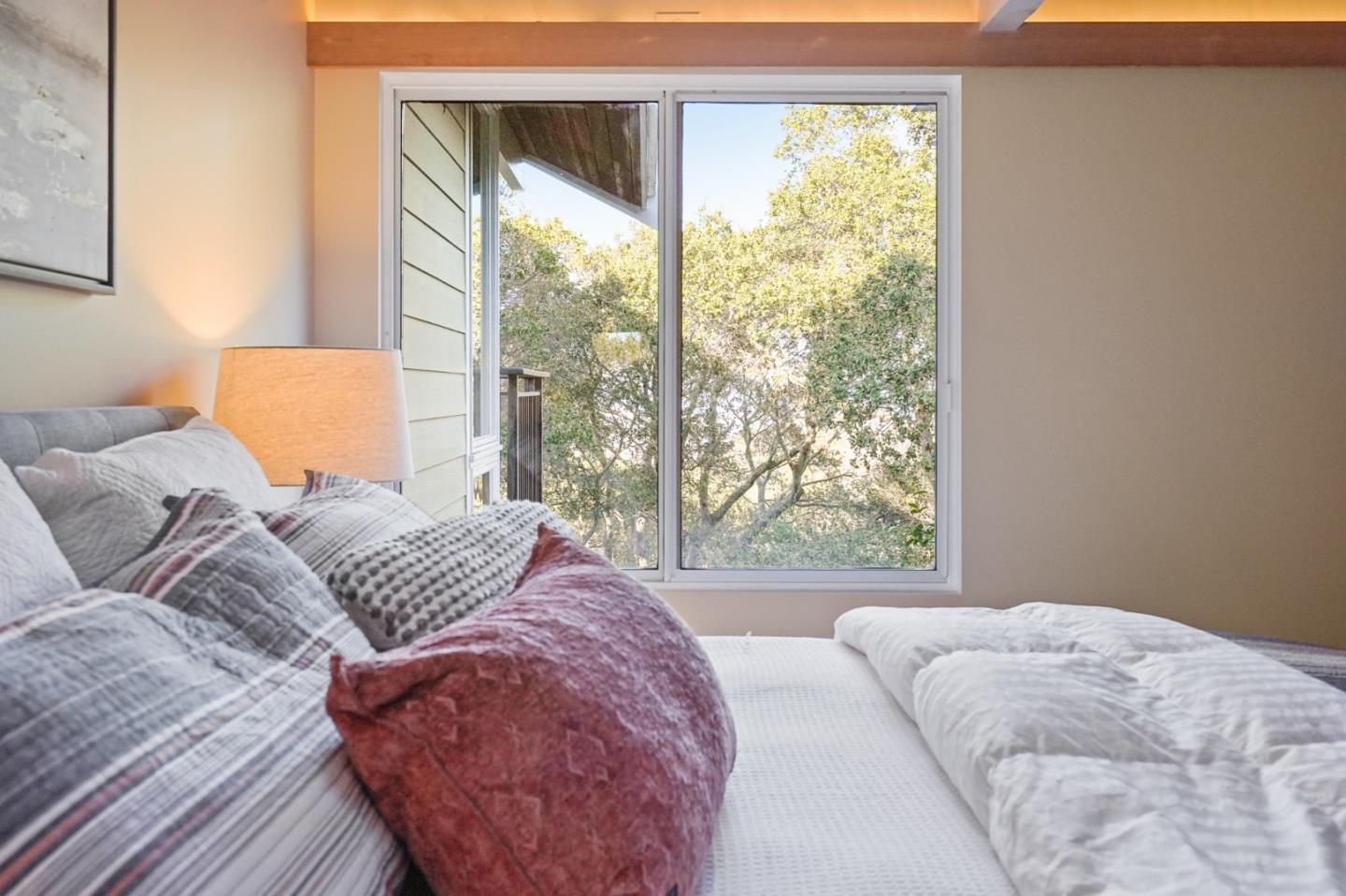 1183 Millbrae Avenue Millbrae, CA 94030 - Photo 43 of 98 a bedroom with a bed and a large window