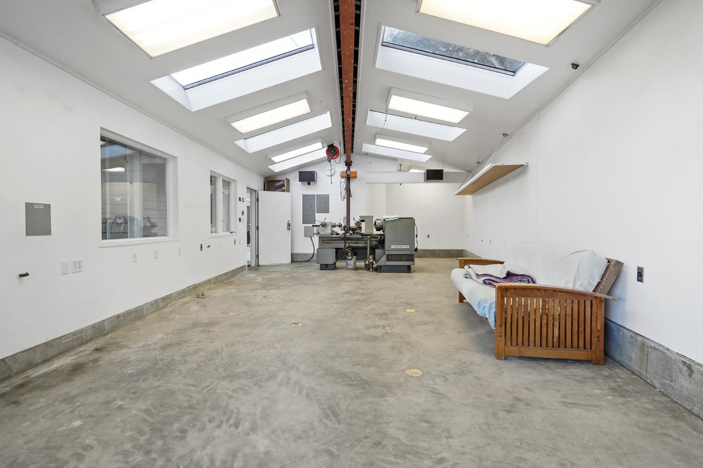 1183 Millbrae Avenue Millbrae, CA 94030 - Photo 69 of 98 a living room with furniture and window