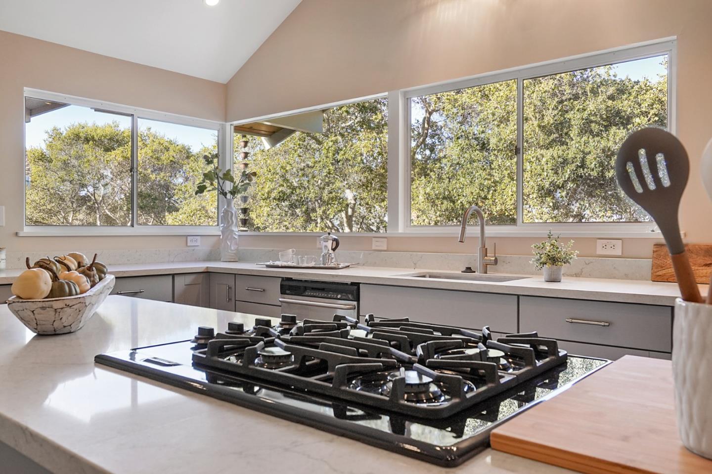 1183 Millbrae Avenue Millbrae, CA 94030 - Photo 8 of 98 a kitchen with a stove a sink and a large window