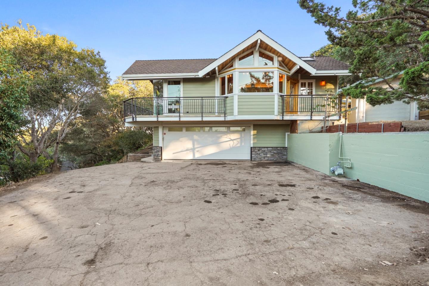 1183 Millbrae Avenue Millbrae, CA 94030 - Photo 85 of 98 a front view of a house with a yard and garage