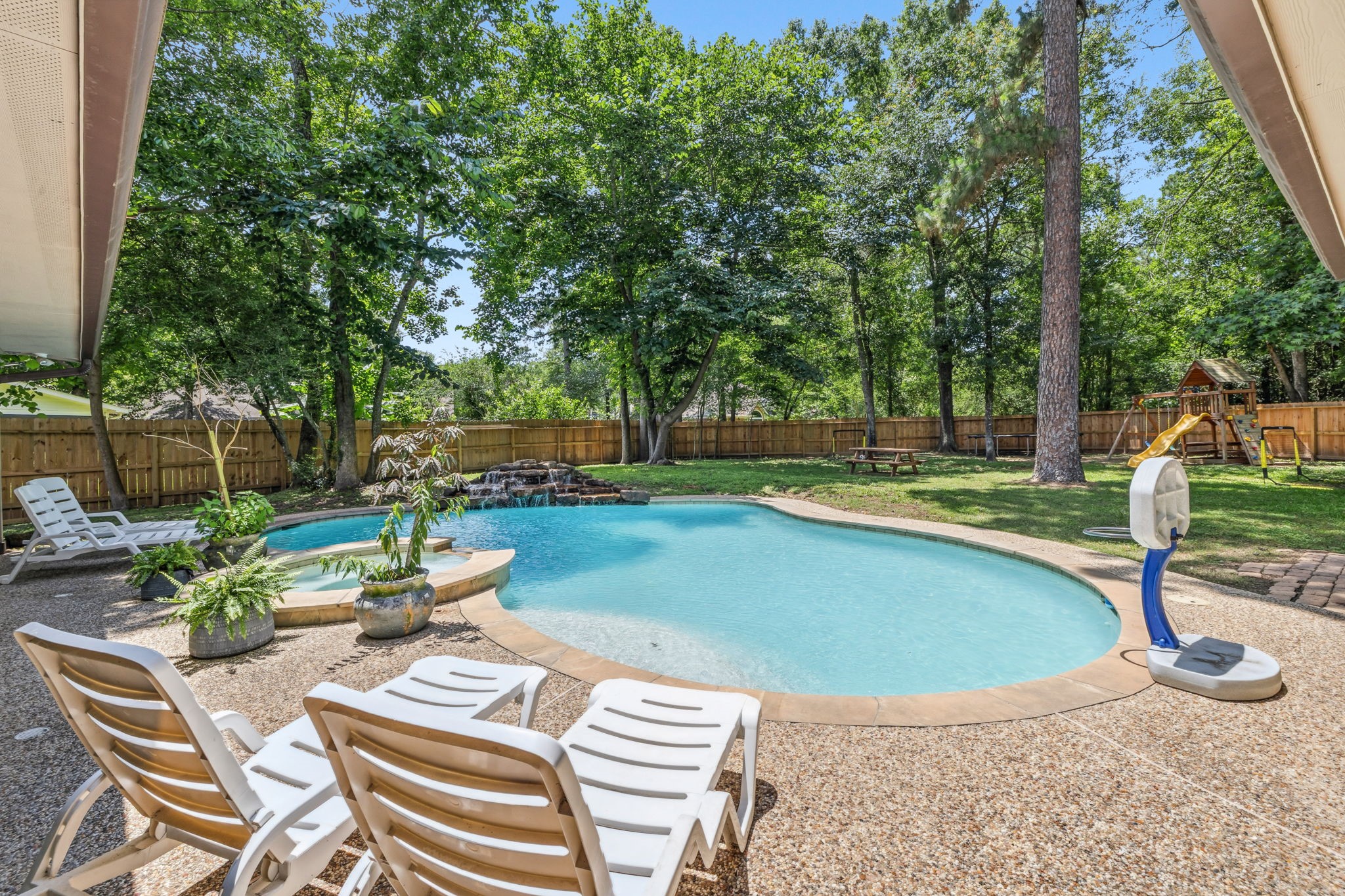 129 North Rainbow Ridge Circle Spring, TX 77381 - Photo 41 of 47 Resort-style pool moments right in your own backyard