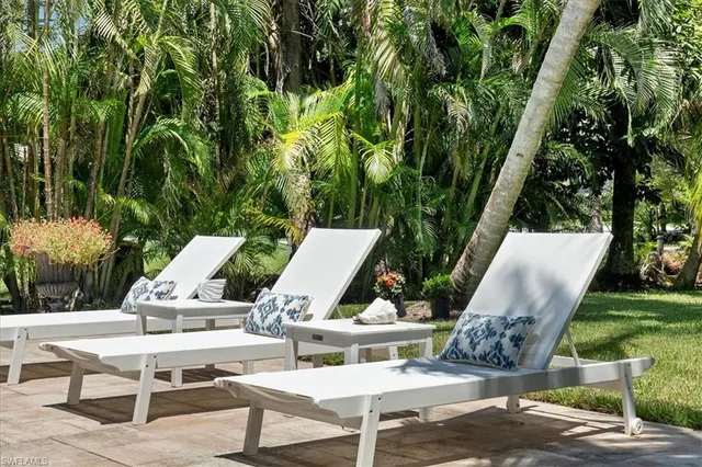 a view of outdoor sitting area with furniture