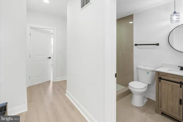 a bathroom with a toilet and a sink