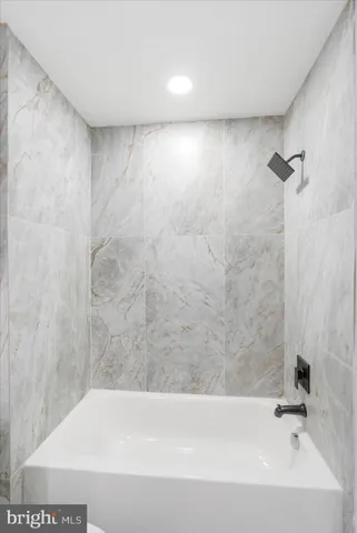 a bathroom with a bathtub