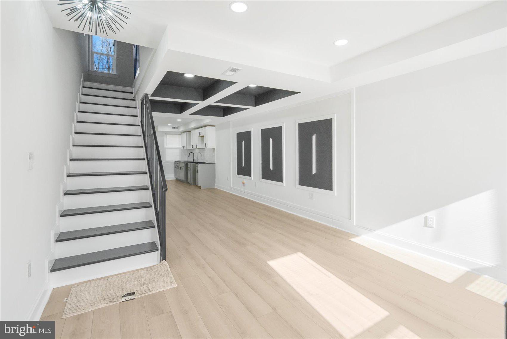 2424 East Biddle Street Baltimore, MD 21213 - Photo 3 of 27 a view of entryway and hall with wooden floor