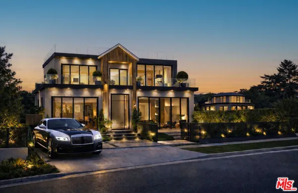 a car parked in front of a house