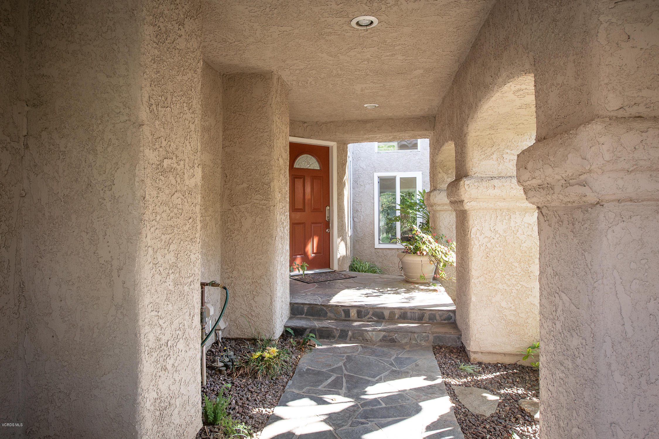 7354 Griffith Lane Moorpark, CA 93021 - Photo 2 of 53 a view of a hallway with windows