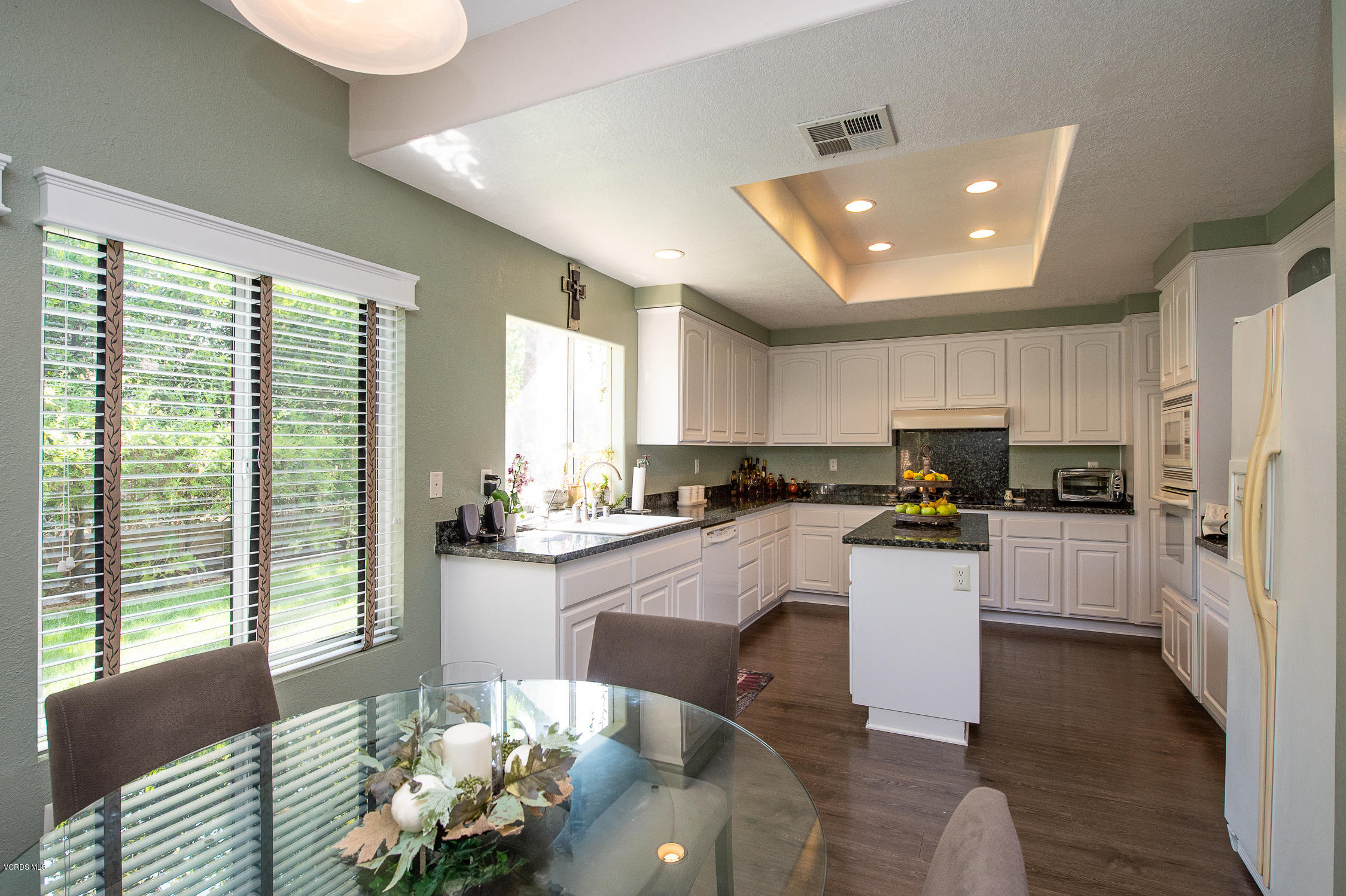 7354 Griffith Lane Moorpark, CA 93021 - Photo 16 of 53 a living room with stainless steel appliances furniture a rug kitchen view and a large window