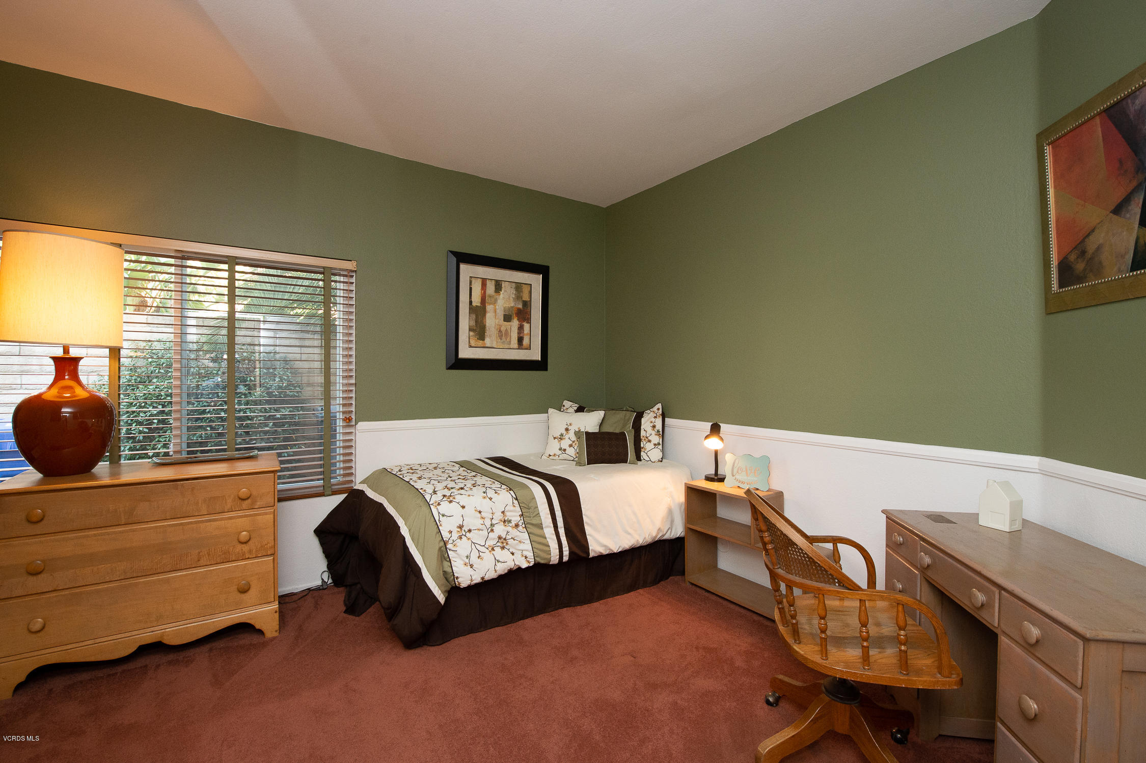 7354 Griffith Lane Moorpark, CA 93021 - Photo 24 of 53 a bedroom with a bed and wooden floor