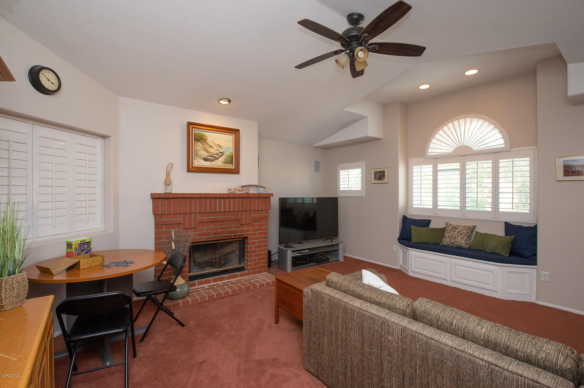 7354 Griffith Lane Moorpark, CA 93021 - Photo 28 of 53 a living room with furniture and a fireplace