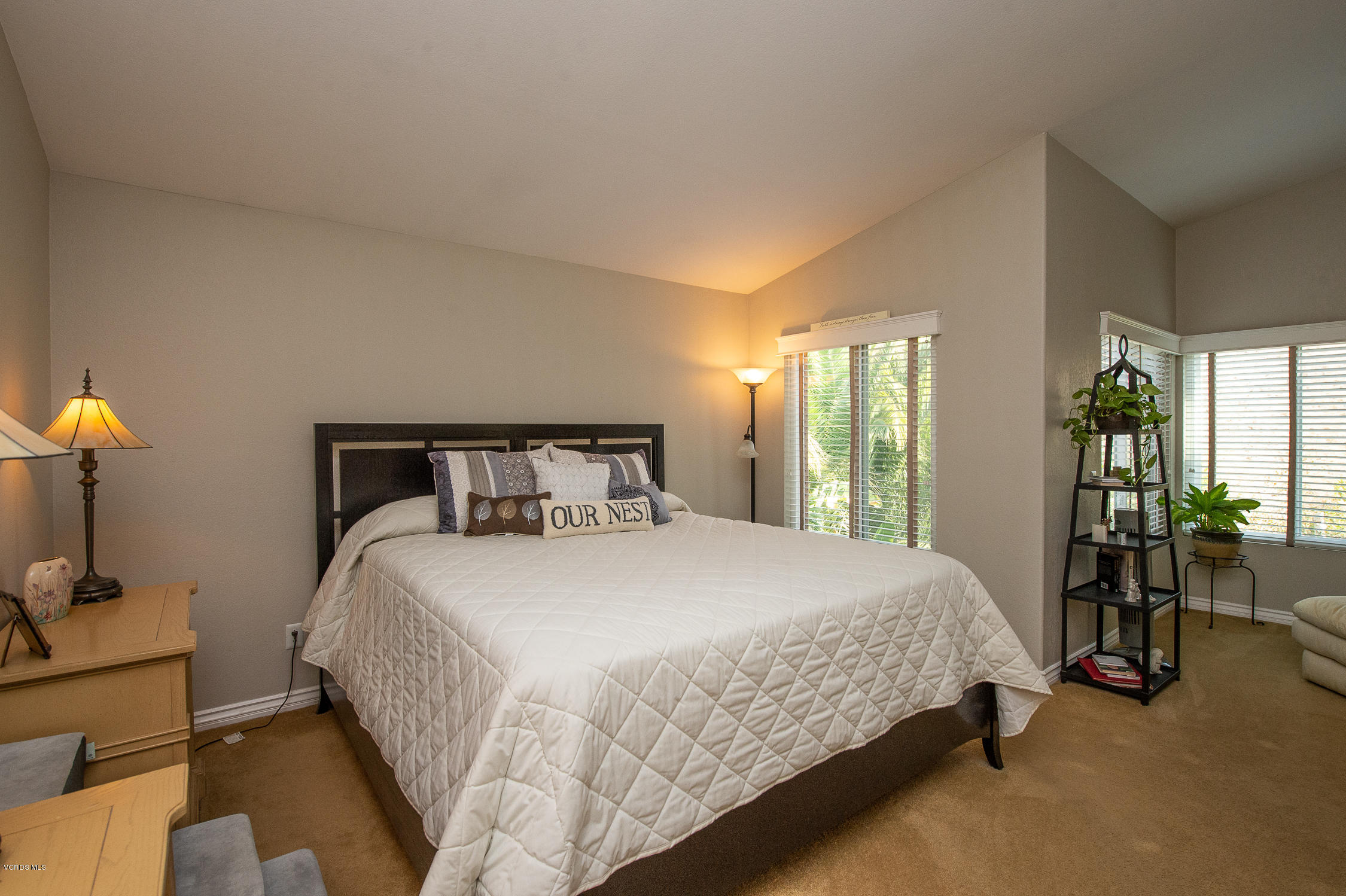 7354 Griffith Lane Moorpark, CA 93021 - Photo 36 of 53 a bedroom with a bed and glass door