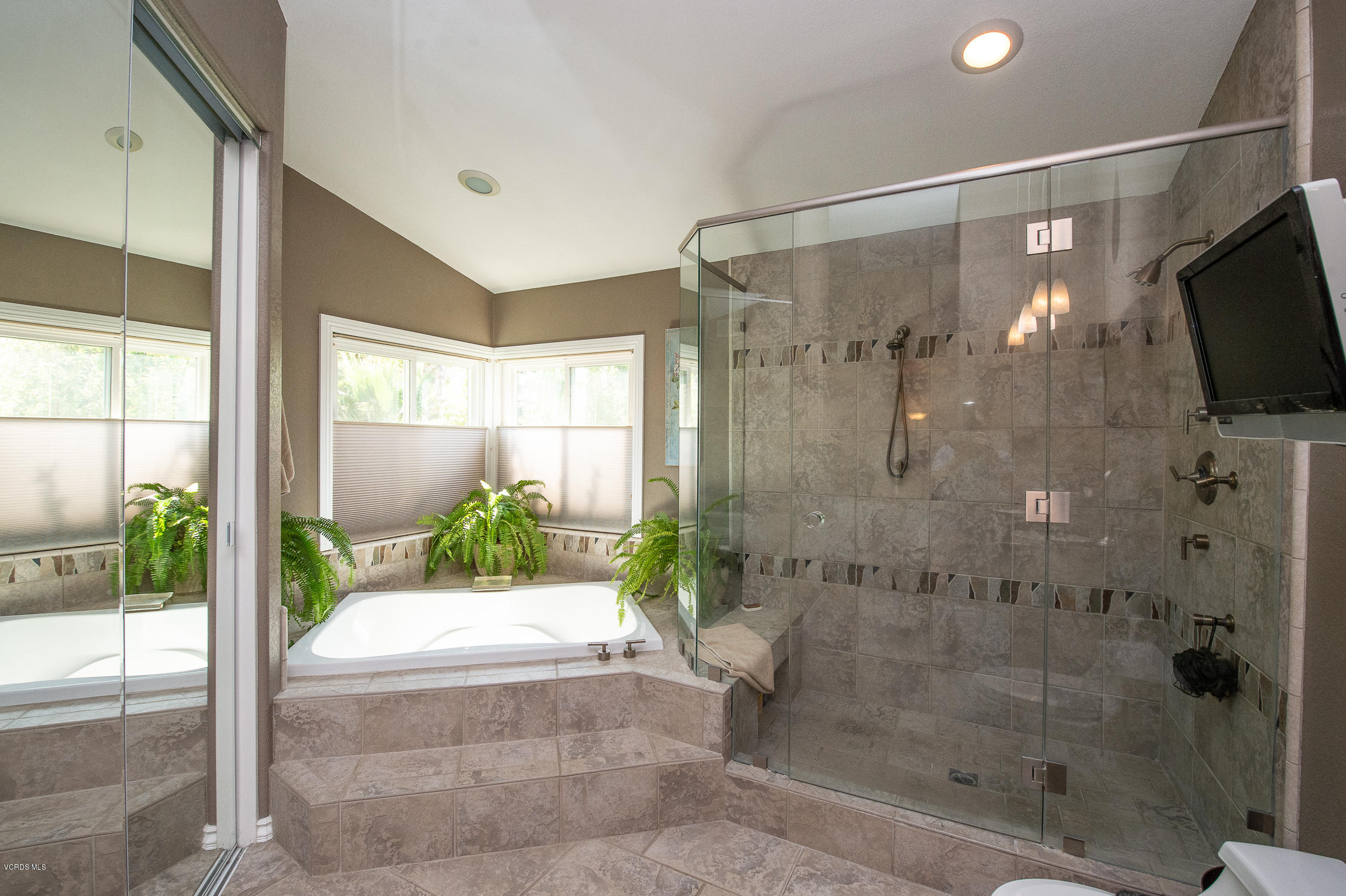 7354 Griffith Lane Moorpark, CA 93021 - Photo 42 of 53 a bathroom with a shower and a tub