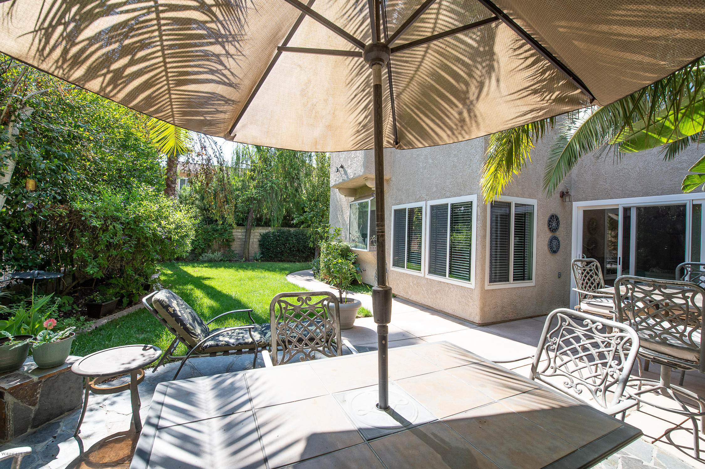 7354 Griffith Lane Moorpark, CA 93021 - Photo 46 of 53 a view of a house with backyard sitting area and garden