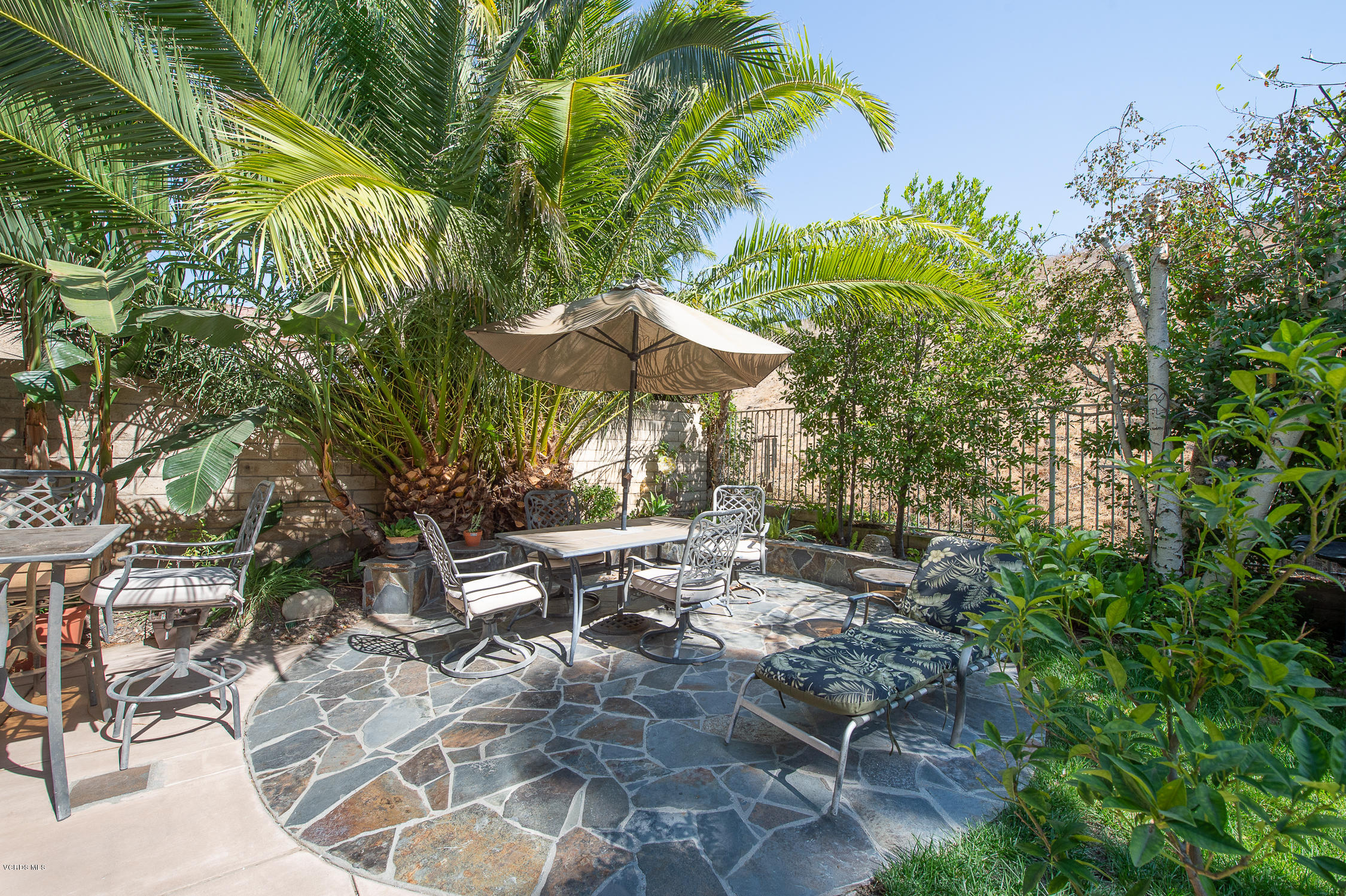 7354 Griffith Lane Moorpark, CA 93021 - Photo 47 of 53 a view of a patio with chairs and plants