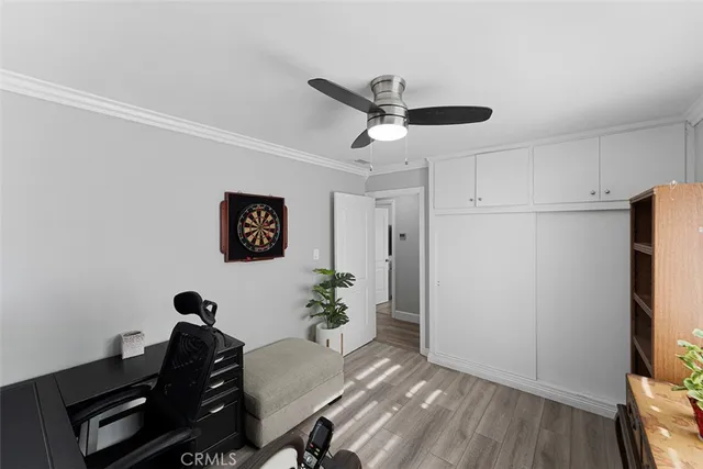 a workspace with furniture and wooden floor