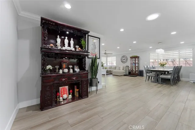 a living room with furniture and fireplace