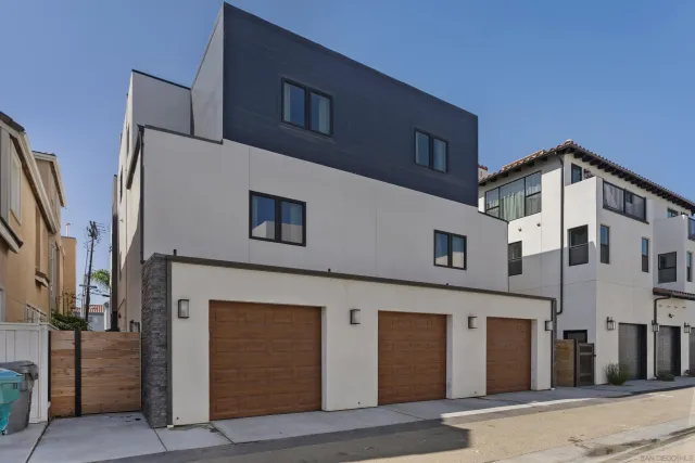 a front view of a building with large windows