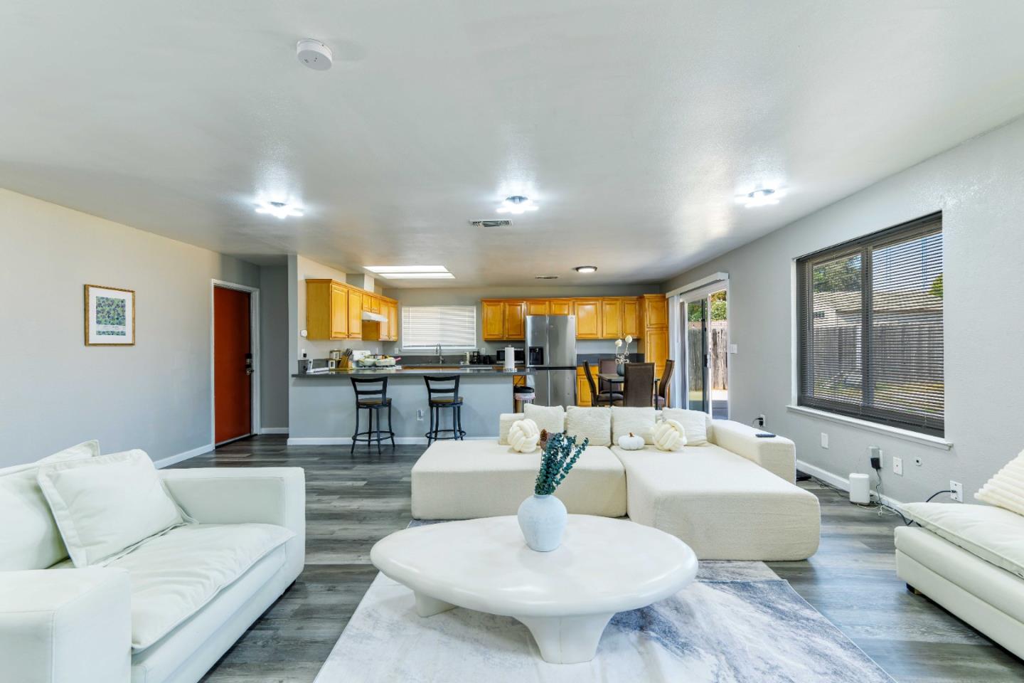 8617 Lodestone Circle Elk Grove, CA 95624 - Photo 1 of 23 a living room with furniture and a large window