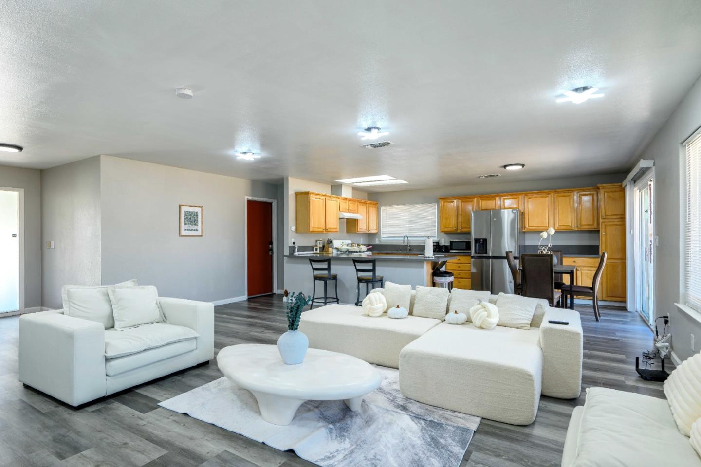 8617 Lodestone Circle Elk Grove, CA 95624 - Photo 2 of 23 a living room with furniture and a large window