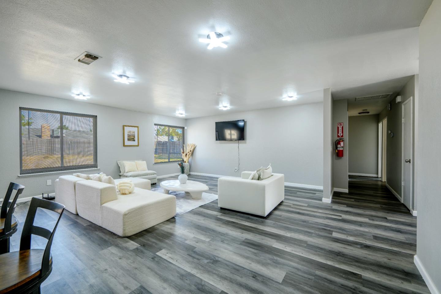 8617 Lodestone Circle Elk Grove, CA 95624 - Photo 3 of 23 a living room with fireplace furniture and a wooden floor