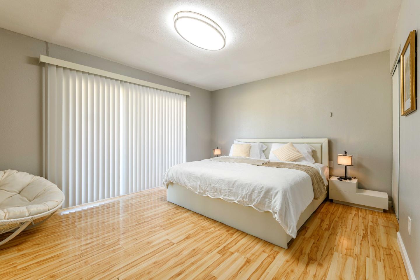 8617 Lodestone Circle Elk Grove, CA 95624 - Photo 7 of 23 a bedroom with a bed and a window